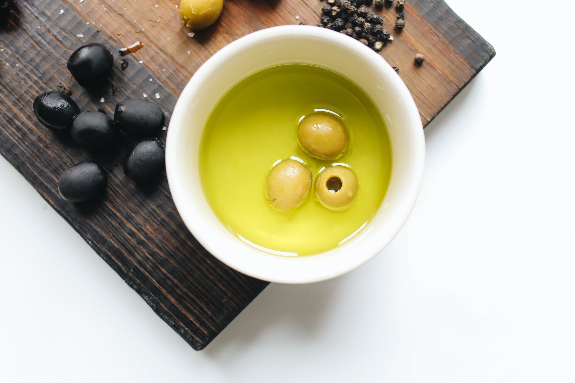 photo of olives on a bowl
Photo by Polina Tankilevitch on Pexels.c